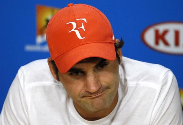 Switzerland's Roger Federer reacts during a news conference after losing his semi-final match against Serbia's Novak Djokovic at the Australian Open tennis tournament at Melbourne Park, Australia, January 28, 2016. REUTERS/Issei Kato