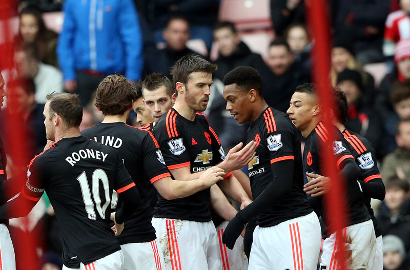Manchester United's Anthony Martial (second right) celebrates his goal with his teammates during the English Premier League soccer match between Sunderland and Manchester United at the Stadium of Light, Sunderland, England, on Saturday, February 13, 2016. Photo: AP