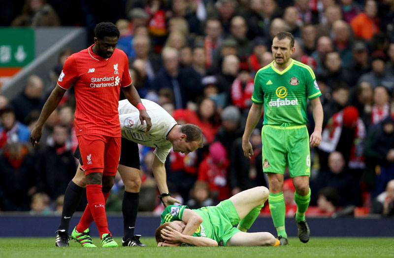 Sunderland's Duncan Watmore lies injured after a challenge during the English Premier League soccer match against Liverpool at Anfield, Liverpool, England, on Saturday February 6, 2016. Photo: Richard Sellers  / PA via AP