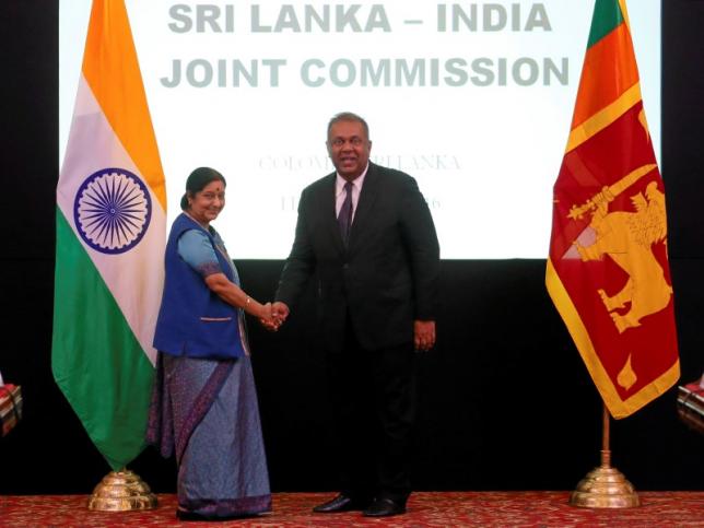 Indian External Affairs Minister Sushma Swaraj (L) shakes hands with Sri Lanka's Foreign Minister Mangala Samaraweera during the Sri Lanka-India Joint Commission meeting in Colombo, Sri Lanka February 5, 2016. REUTERS/Dinuka Liyanawatte