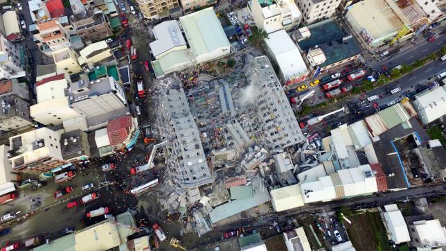 A site where buildings collapsed is seen in this aerial picture taken after a powerful earthquake hit Tainan, southern Taiwan, February 6, 2016. REUTERS/Xinhua
