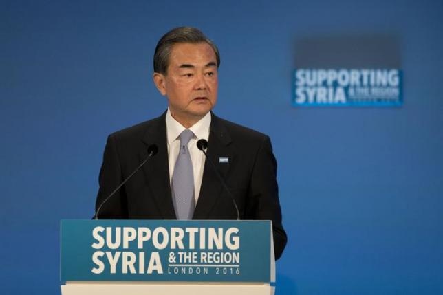 China's Foreign Minister Wang Yi makes a pledge makes a pledge during the second makes a pledge during the second 'Thematic Pledging Session' at the donors Conference for Syria in London, Britain February 4, 2016.  REUTERS/Matt Dunham/pool