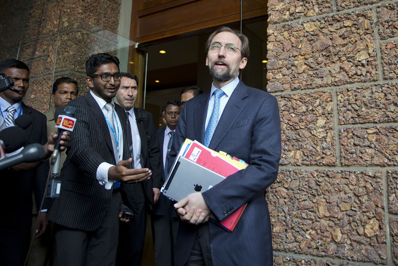 UN High Commissioner for Human Rights Zeid Raad al-Hussein, right, pauses to speak to media as he leaves a hotel in Colombo, Sri Lanka,on Saturday, February 6, 2016. Photo: AP