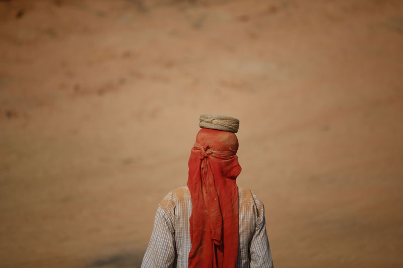 A migrant worker heads to his job at a brick kiln in Sipadol, Bhaktapur on Wednesday, February 3, 2016. Photo: Skanda Gautam