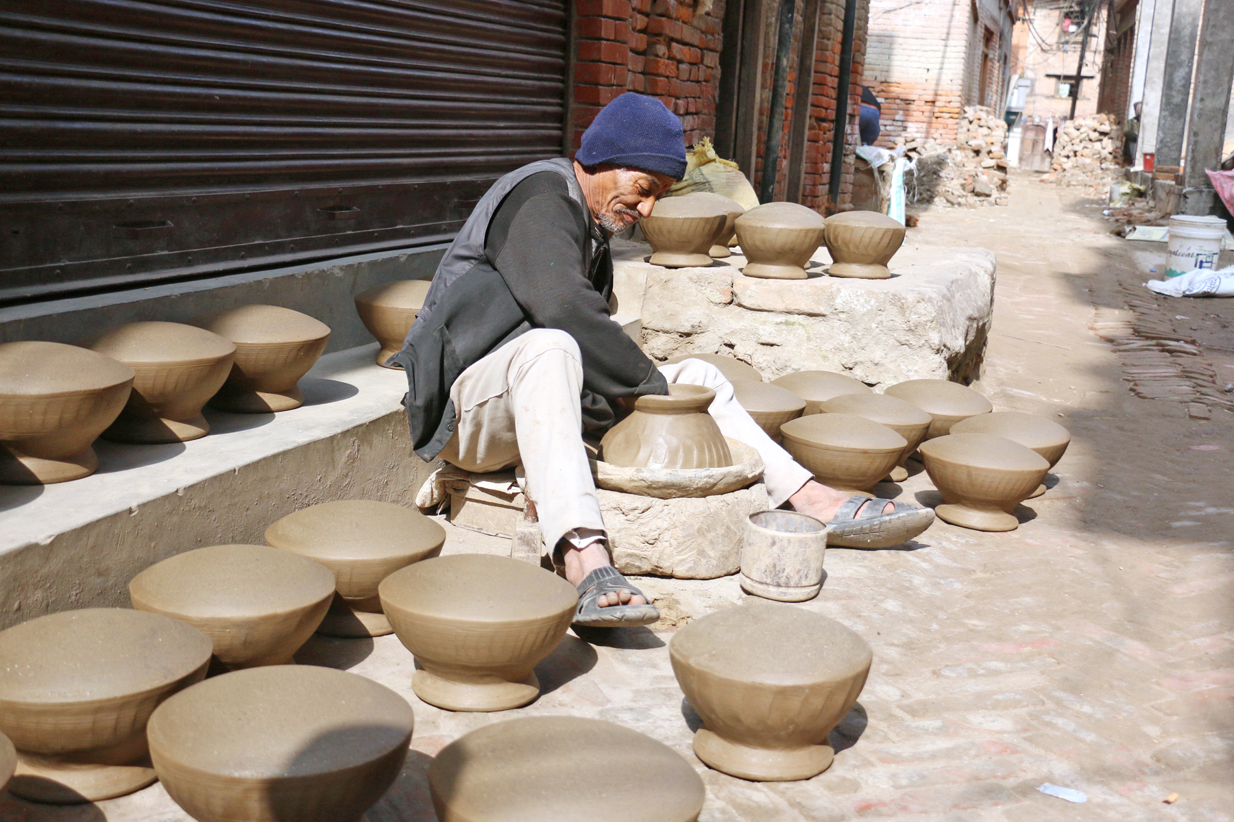 An elderly man making pottery in Bhaktapur on Thursday, February 4, 2016. Photo: RSS