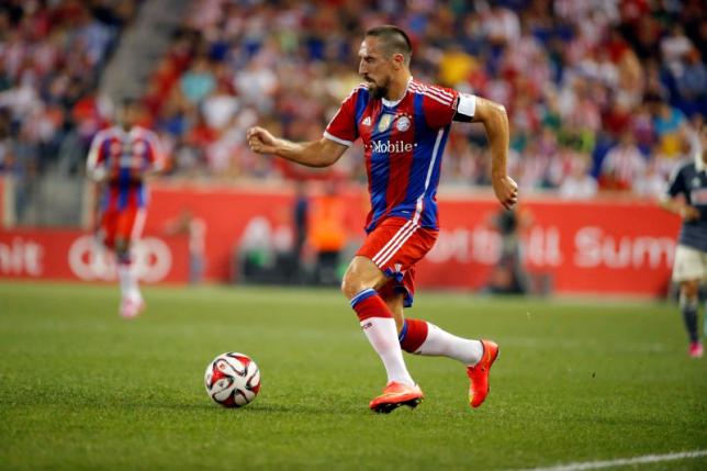 Jul 31, 2014; Harrison, NJ, USA;  Bayern Munich midfielder Franck Ribery (7) brings the ball up field during the first half against the Chivas Guadalajara at Red Bull Arena. Photo:  Jim O'Connor-USA TODAY Sports