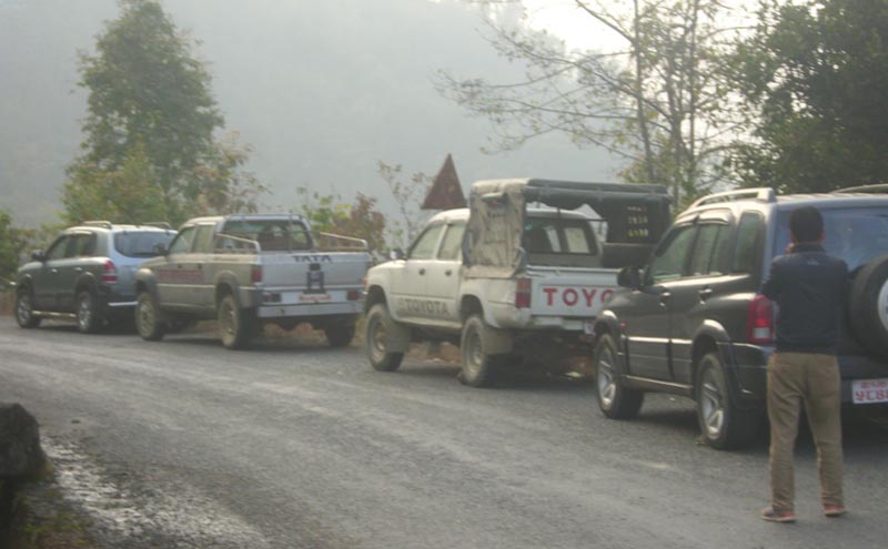 Government vehicles parked by the Mechi Highway in Lalikharka of Panchthar, on Saturday, February 20, 2016. Ofificials of Phidim-based government offices had used the vehicles for a picnic. Photo: Laxmi Gautam.