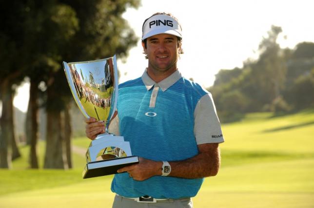 February 21, 2016; Pacific Palisades, CA, USA; Bubba Watson poses with the winners trophy following his victory of the Northern Trust Open golf tournament at Riviera Country Club. Photo: Reuters