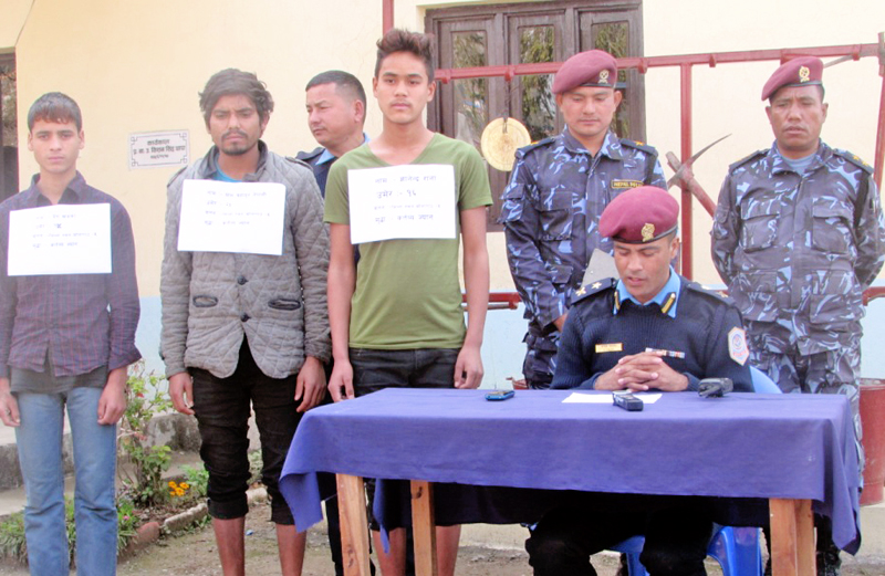 Police making three persons public for their involvement in killing Susmita Shah of Kholagaun under the influence of alcohol, in District Police Office, Rukum, on Tuesday, March 1, 2016. Photo: THT