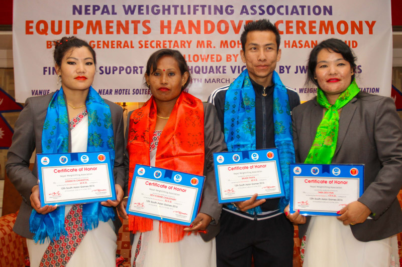 (From left) The 12th South Asian Games medal winning lifters Junu Maya Chhantyal, Devi Chaudhary, Bikash Thapa and Tara Devi Pun pose for a photo after being felicitated by Nepal Weightlifting Association in Kathmandu on Monday. Photo: Udipt Singh Chhetry/THT