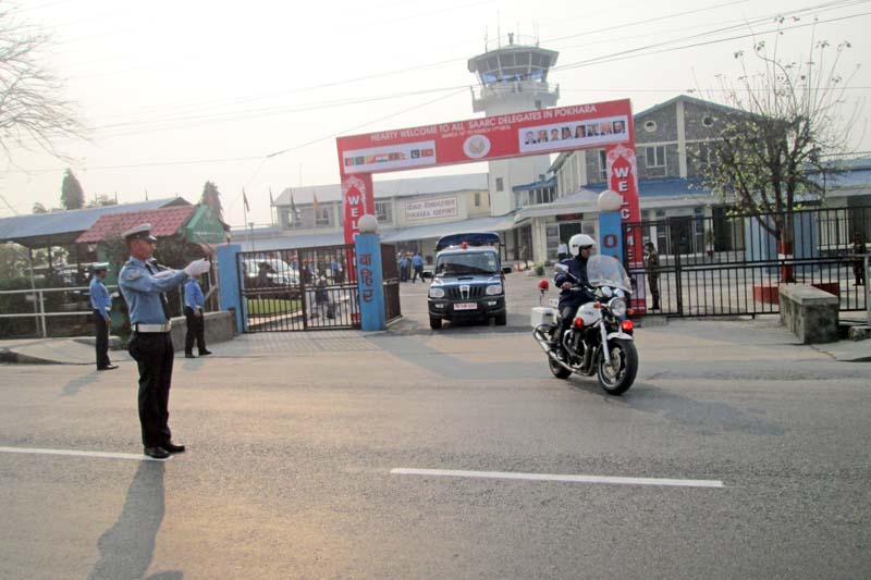 A traffic police gestures during a dummy preparation of the travel route of the distinguished guests from Pokhara Airport to Pokhara Grand Hotel, the venue of the 37th Session of the South Asian Association Regional Cooperation (SAARC) Council of Ministers, exercised on Sunday, March 13, 2016. Photo: Rishi Ram Baral/ THT