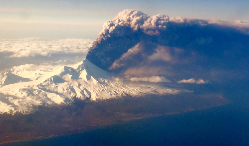 Pavlof Volcano, one of Alaska's most active volcanoes, erupts, sending a plume of volcanic ash into the air, on Sunday, March 27, 2016. Photo: Colt Snapp via AP