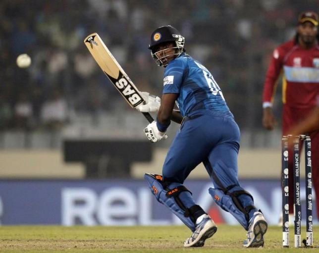 Sri Lanka's Angelo Mathews plays a ball against the West Indies during their semi-final match at the ICC Twenty20 World Cup in the Sher-e-Bangla National Cricket Stadium in Dhaka April 3, 2014. REUTERS/Andrew Biraj/Files