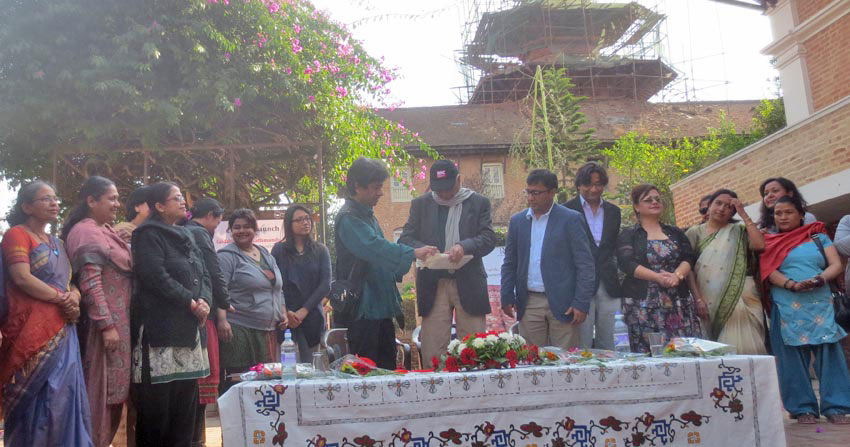Prof Arun Gupto's book Goddesses of Kathmandu Valley being released in the premises of the Patan Museum. Photo: THT Online