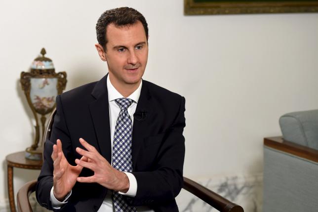Syria's President Bashar al-Assad speaks during an interview with Spanish newspaper El Pais in Damascus, in this handout picture provided by SANA on February 20, 2016. Picture taken February 20, 2016. REUTERS/SANA/Handout via Reuters