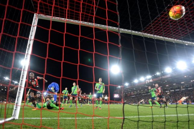 Football Soccer - AFC Bournemouth v Southampton - Barclays Premier League - Vitality Stadium - 1/3/16nBournemouth's Benik Afobe scores their second goalnReuters / Toby MelvillenLivepic