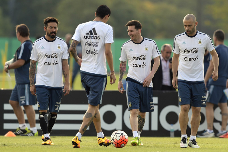 (From left) Argentina's Ezequiel Lavezzi, Angel Di Maria, Lionel Messi and Javier Mascherano take part in a training session in Ezeiza, Buenos Aires, on Tuesday. Photo: AFP