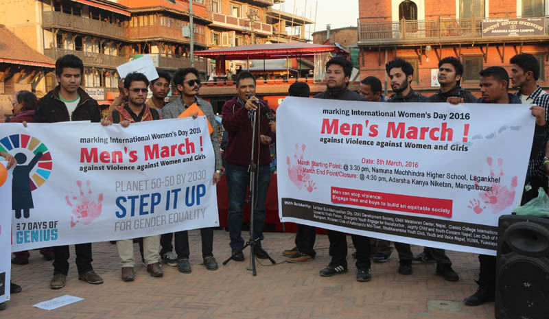 Leading human rights activist Gauri Pradhan (centre) addresses a corner meeting organised to express commitment of men against violence against women and girls, in Lalitpur, on Tuesday, March 8, 2016. Photo: Men's March Organising Team