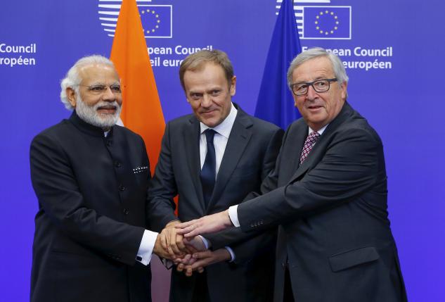 India's Prime Minister Narendra Modi (L) is welcomed by European Council President Donald Tusk (C) and European Commission President Jean-Claude Juncker at the start of a EU-India Summit in Brussels, Belgium, March 30, 2016.   REUTERS/Yves Herman