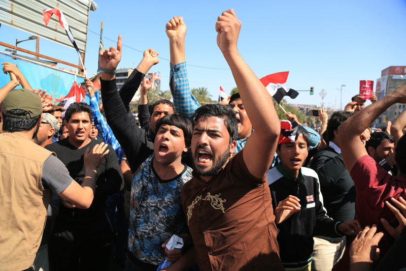 Followers of Shiite cleric Muqtada al-Sadr protest in central Baghdad, Iraq, on Friday, March 18, 2016. Photo; AP