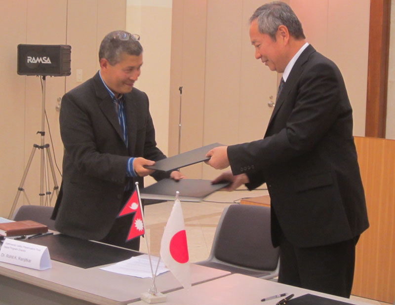 Kathmandu Valley Preservation Trust (KVPT) Programme Director Rohit K Ranjitkar (left) and Japanese Ambassador to Nepal Masashi Ogawa exchange an agreement on the Grant Assistance for Cultural Grassroots Project (GCGP) scheme, in Kathmandu, on Wednesday, March 2, 2016. Photo: Japanese Embassy in Kathmandu