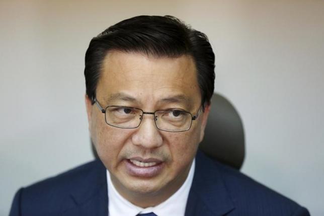 Malaysia's transport minister Liow Tiong Lai speaks at a news conference about debris found on a beach in Mozambique that may be from missing Malaysia Airlines flight MH370, in Kuala Lumpur, Malaysia, March 3, 2016.  REUTERS/Olivia Harris