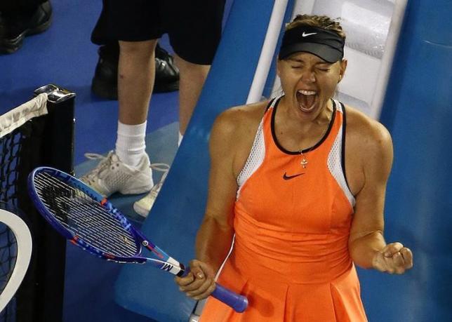 Russia's Maria Sharapova celebrates after winning her fourth round match against Switzerland's Belinda Bencic at the Australian Open tennis tournament at Melbourne Park, Australia, January 24, 2016. REUTERS/Jason O'Brien Action Images via Reuters/Files