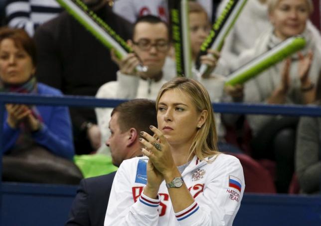 Russia's Maria Sharapova reacts as she watches compatriot Ekaterina Makarova play against Kiki Bertens of the Netherlands during their Fed Cup World Group tennis match in Moscow, February 6, 2016.  REUTERS/Grigory Dukor