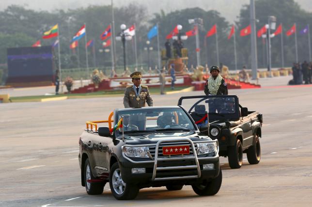 Commander-in-chief Min Aung Hlaing rides on a vehicle during a parade to mark Armed Forces Day in Myanmar's capital Naypyitaw, March 27, 2016. REUTERS/Soe Zeya Tun