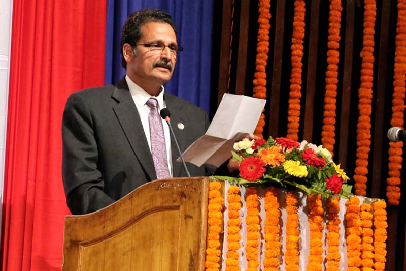 FILE - Minister for Forest and Soil Conservation Agni Prasad Sapkota speaking during the 4th Woodcraft Festival held on the occasion of World Wood Day, in the premises of National Academy Hall, Kamaladi, on Monday, March 21, 2016. Photo: RSS
