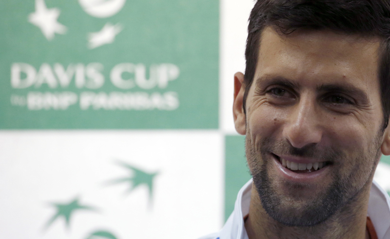 Serbian Davis Cup team player Novak Djokovic smiles during a press conference in Belgrade, Serbia, Wednesday, March 2, 2016. Photo: AP