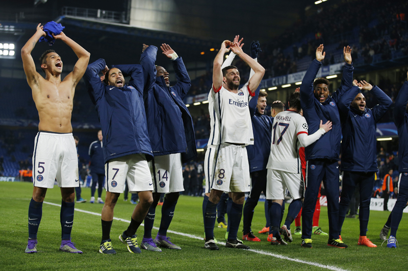 PSG's Marquinhos, Lucas Moura and Blaise Matuidi Thiago Motta and teammates celebrate after the matchn against Chelsea at Stamford Bridge. Photo: Reuters