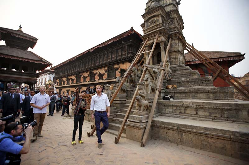 Prince Harry visits Bhaktapur Durbar Square, a UNESCO world heritage site, and temples in the premises which were damaged by earthquakes of last year, in Bhaktapur, on Sunday, March 20, 2016. Photo: Skanda Gautam/ THT