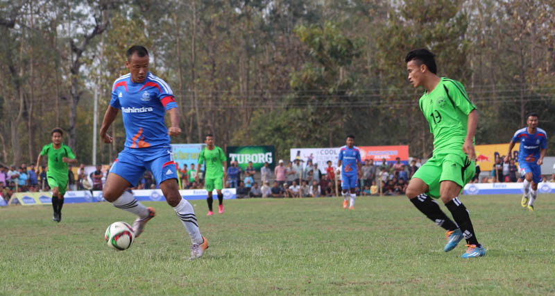 APF skipper Ganesh Lawati controls the balls as Rupandehiu0092s Devendra Tamang looks on during their Ruslan seventh Simara Gold Cup Football Tournament  match at the Simara Stadium on Sunday. Rupandehi won the match 2-1 in extra time. Photo: THT