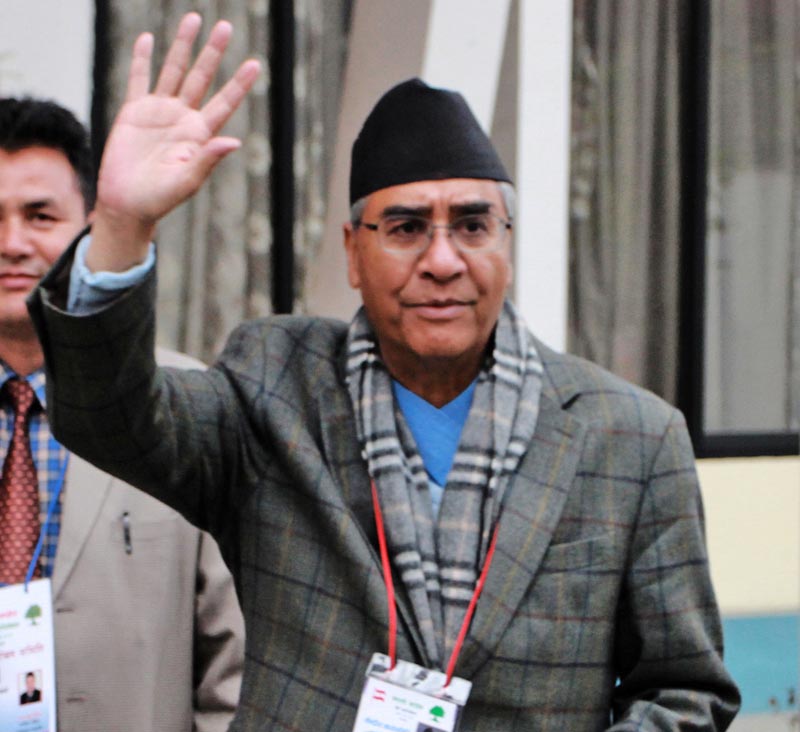 Nepali Congress President candidate Sher Bahadur Deuba waves during the election in Kathmandu on Sunday, March 6, 2016. Photo: RSS
