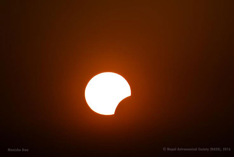 FILE - A partial solar eclipse as seen from Nagarkot, Bhaktapur, on Wednesday, March 09, 2016. Photo:  Nepal Astronomical Society