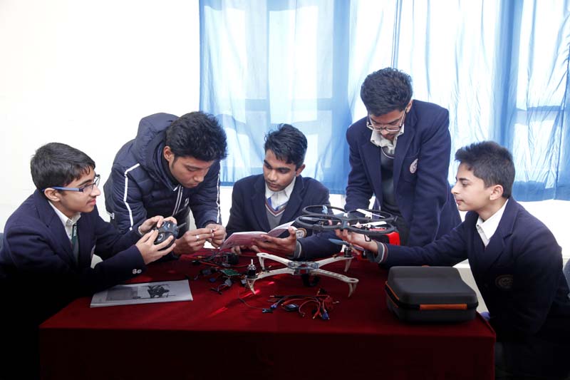 Students of the Kanjirowa National Higher Secondary School during an international interactive drone project in Balkumari, on Friday, March 25, 2016. Photo: Kanjirowa National H.S. School