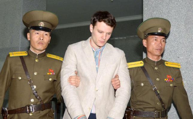 Otto Frederick Warmbier (C), a University of Virginia student who was detained in North Korea since early January, is taken to North Korea's top court in Pyongyang, North Korea, in this photo released by Kyodo March 16, 2016. Mandatory credit REUTERS/Kyodo