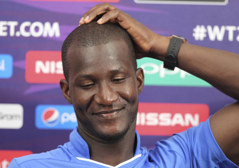 West Indiesu0092 cricket team captain, Darren Sammy, reacts during a press conference ahead of their ICC Twenty20 2016 Cricket World Cup semi-final match against India in Mumbai, India, on Wednesday, March 30, 2016. Photo: AP