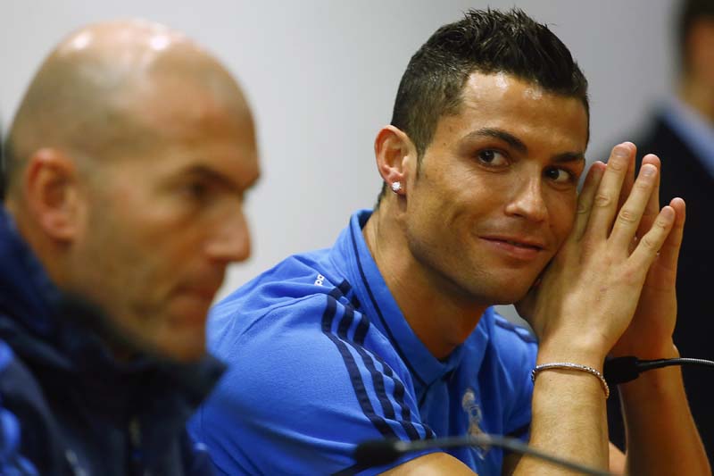 Real Madrid's Cristiano Ronaldo and coach Zinedine Zidane attend a news conference prior to their Champions League soccer match against AS Roma at the Olympic stadium in Rome, Italy on February 16, 2016. Photo: Reuters