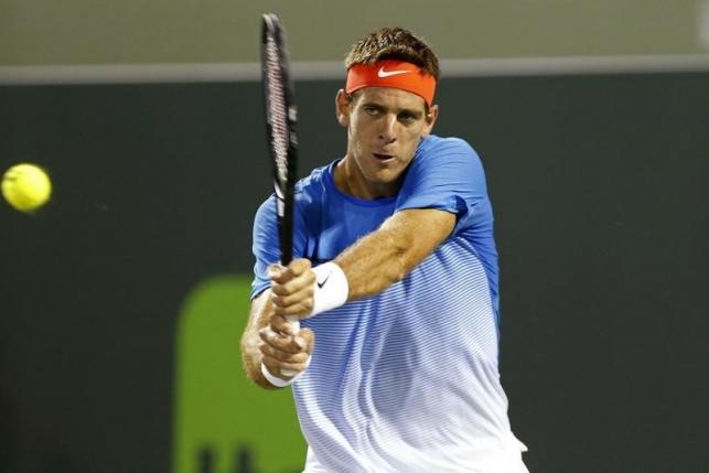 Mar 23, 2016; Key Biscayne, FL, USA; Juan Martin Del Potro hits a backhand against Guido Pella (not pictured) during day two of the Miami Open at Crandon Park Tennis Center. Del Potro won 6-0, 7-6(5). Mandatory Credit: Geoff Burke-USA TODAY Sports