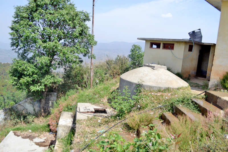 Water tanks and toilets that have turned useless due to lack of proper monitoring and repairs, in Khalanga Bazaar, Dadeldhura, on Sunday, March 20, 2016. Photo: THT