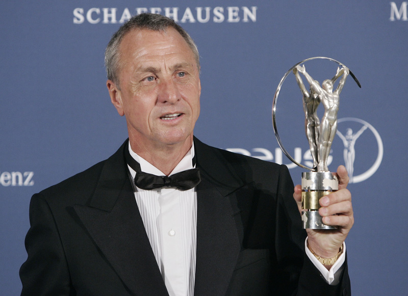 FILE - In this Monday May 22, 2006 file photo, Dutch soccer legend Johan Cruyff holds his lifetime achievement award during the Laureus World Sports Awards in Barcelona, Spain. Photo: AP