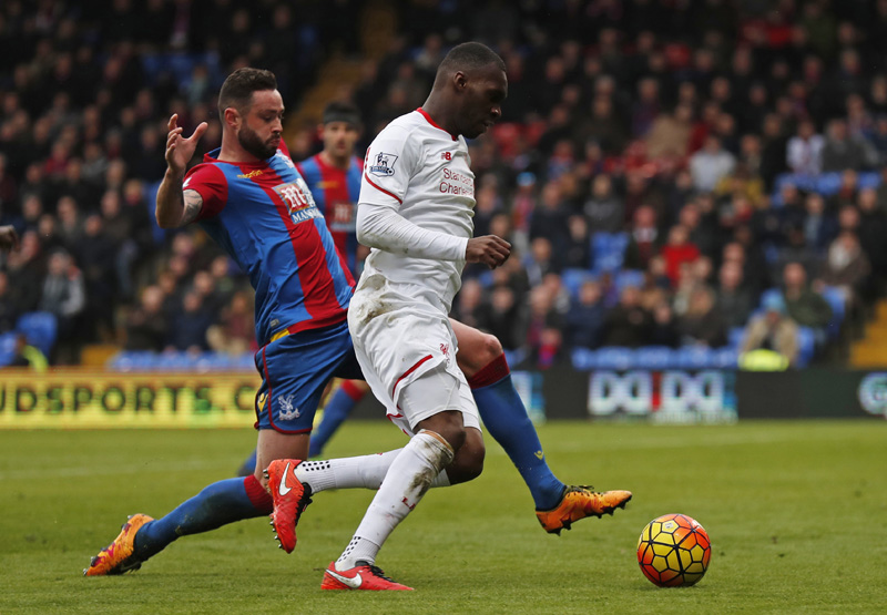 Crystal Palace's Damien Delaney fouls Liverpool's Christian Benteke resulting in a penalty during Barclays Premier League game at Selhurst Park on Sunday, March 6, 2016. Photo: Reuters