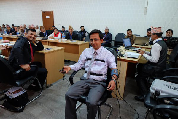 Advisors of the United States Department of Justice and officials of Nepal Police test a polygraph machine, also known as a lie detector, at the Commission for the Investigation of Abuse of Authority, in Kathmandu, on Saturday, March 19, 2016. Photo: https://twitter.com/USEmbassyNepal