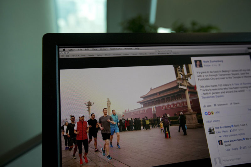 A computer screen displays the social media posting by Mark Zuckerberg on Facebook in Beijing, China, on Friday, March 18, 2016. Photo: AP