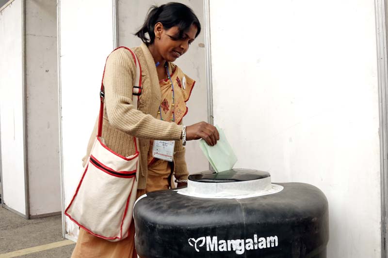 A woman casting her vote in the party election during the 13th General Convention at the City Hall, Bhrikutimandap, on March 6, 2016. Photo: RSS