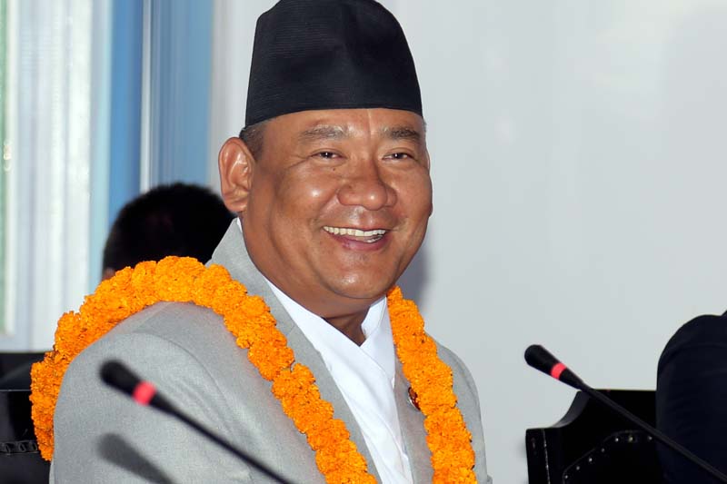 Newly elected Assistant Minister for Federal Affairs and Local Development Resham Bahadur Lama smiles for the camera after being administered to the post in Singha Durbar, on Wednesday, April 27, 2016. Photo: RSS