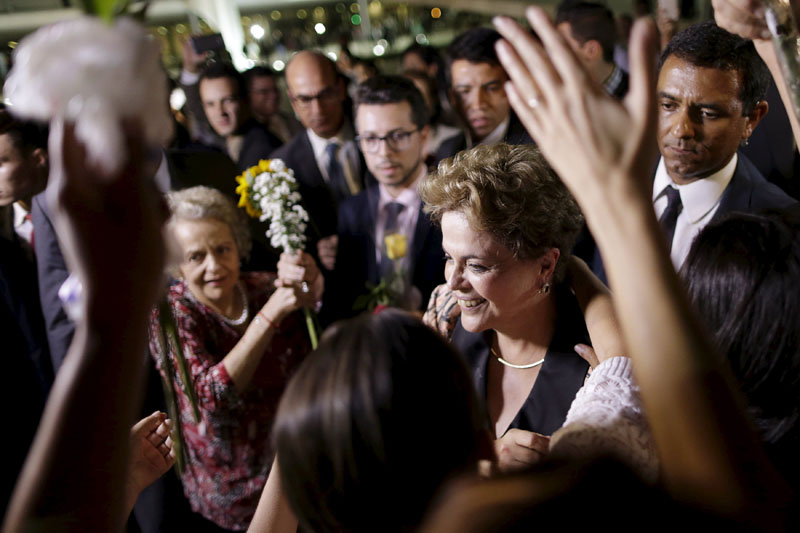 Brazil's President Dilma Rousseff greets women during a rally in support of her and against her impeachment in front of Planalto Palace in Brasilia, Brazil, on April 19, 2016. Photo: Ueslei Marcelino/Reuters