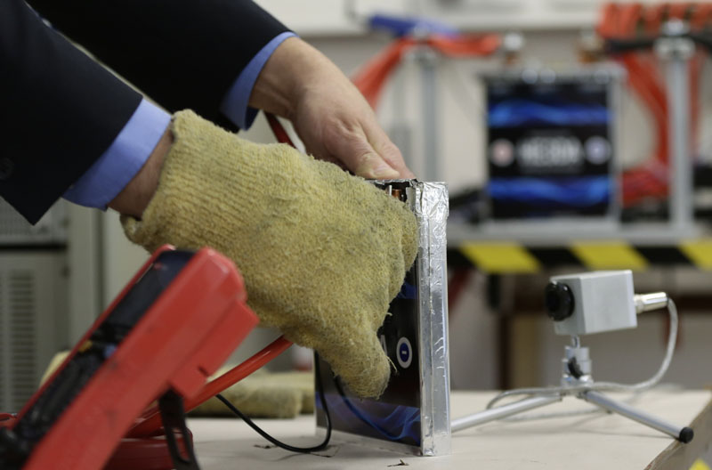 Jan Prochazka the president of Prague based He3Da company, tests his battery in Prague, Czech Republic, on Wednesday, March 9, 2016. Photo: AP